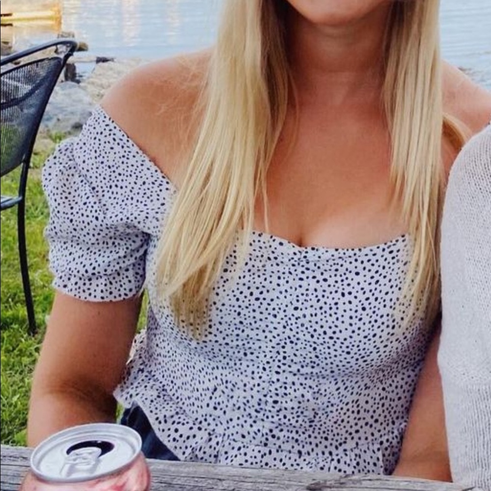 Speckled black and white top